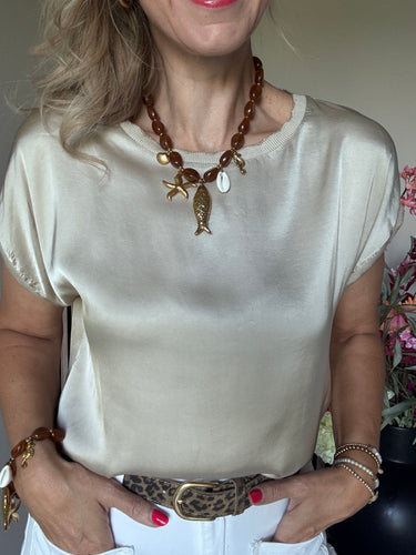 Kastgeluk satinlook top gold detail